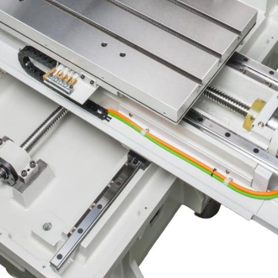 Linear rail guideway and ball screw under the machine table